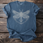 Blue t-shirt with white dragonfly and celestial graphic including stars and crescent moons.