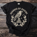 Black t-shirt with a raven on a triangle, surrounded by an oak leaf wreath and text.