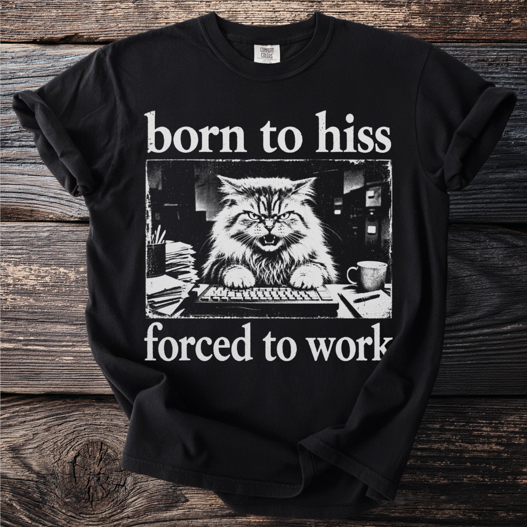 Black t-shirt with "born to hiss forced to work" and a grumpy cat at a desk.