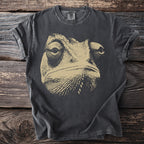 Dark gray Comfort Colors t-shirt with a light tan close-up graphic of a chameleon's face.