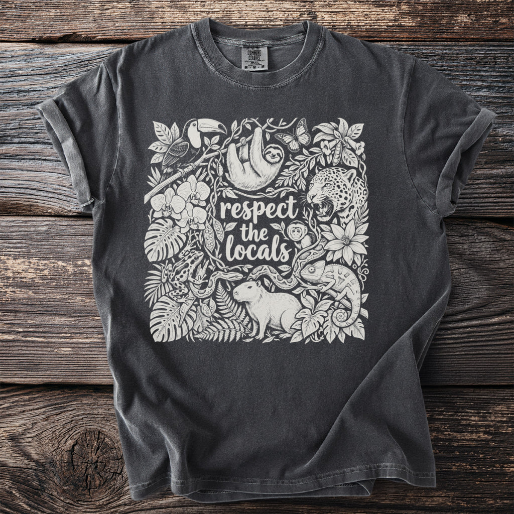 T-shirt with jungle animals and the text "respect the locals" in a floral design.