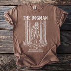 Brown t-shirt with The Dogman, Michigan 1887 graphic featuring a wolf-like creature.