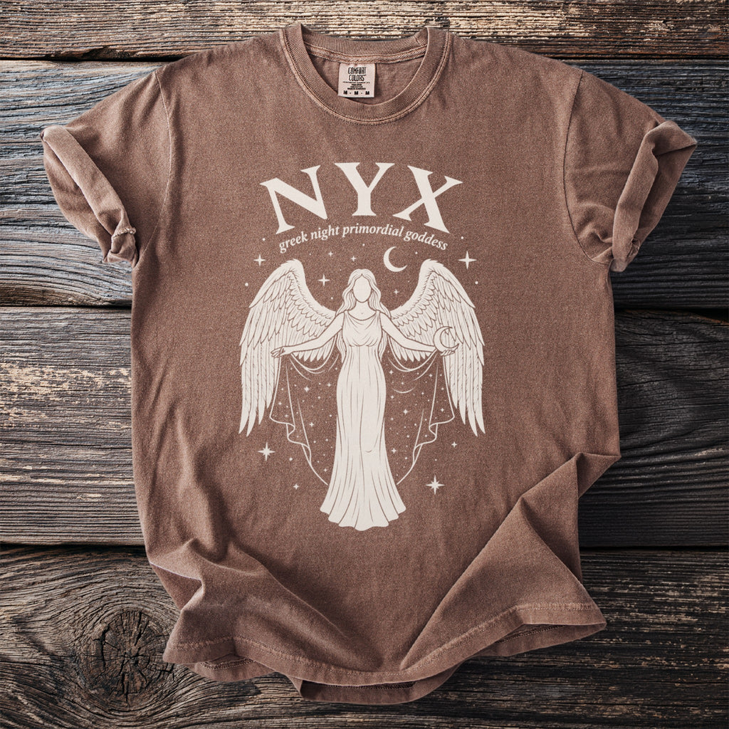 Brown t-shirt with graphic of Nyx, greek night primordial goddess with wings.