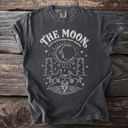 Dark gray t-shirt with "The Moon tarot card arcana lunar mystery" graphic.