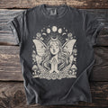 Dark grey t-shirt featuring a beige mystical fairy with wings, moon phases, and floral elements.
