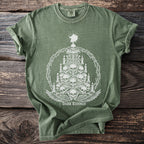 Green t-shirt with skeletal Christmas tree, skulls, candles, and "Dark Tidings" text.