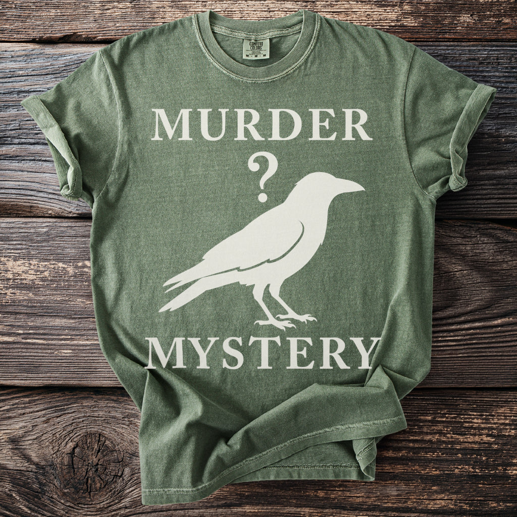 Green t-shirt with "Murder Mystery" and a crow graphic.