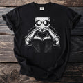 Black t-shirt with Invisible Man graphic making heart shape with gloved hands.