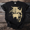 Black t-shirt with a beige wolf graphic and "COMFORT COLORS" neck tag.
