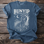 Bunyip Australian swamp cryptid legend graphic on a blue t-shirt.
