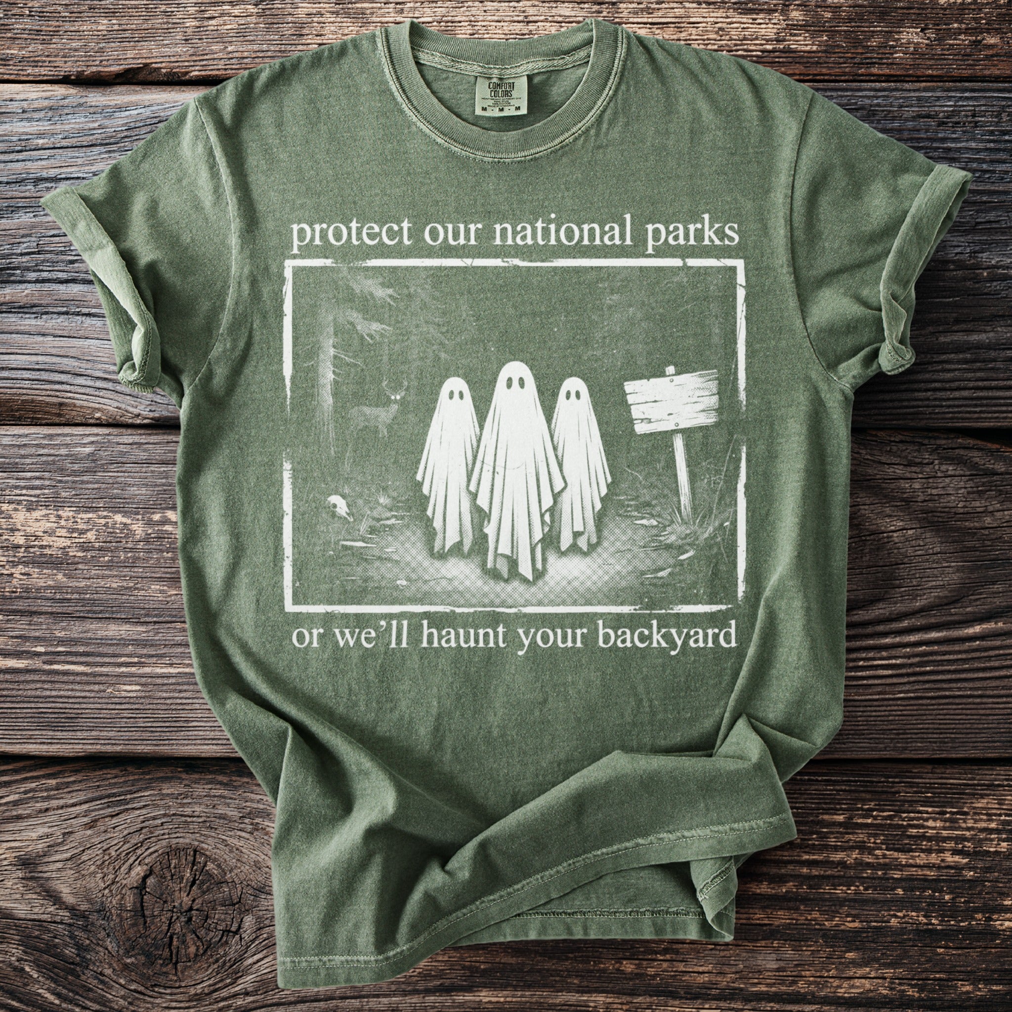 Green t-shirt with "protect our national parks" and ghosts design.
