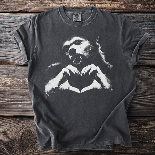 Gray t-shirt with a white graphic of a werewolf forming a heart with its hands.