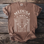 Brown t-shirt with white Medusa greek mythology gorgon legend graphic.
