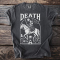 T-shirt with white graphic of a skeleton riding a horse, holding a flag with a rose.