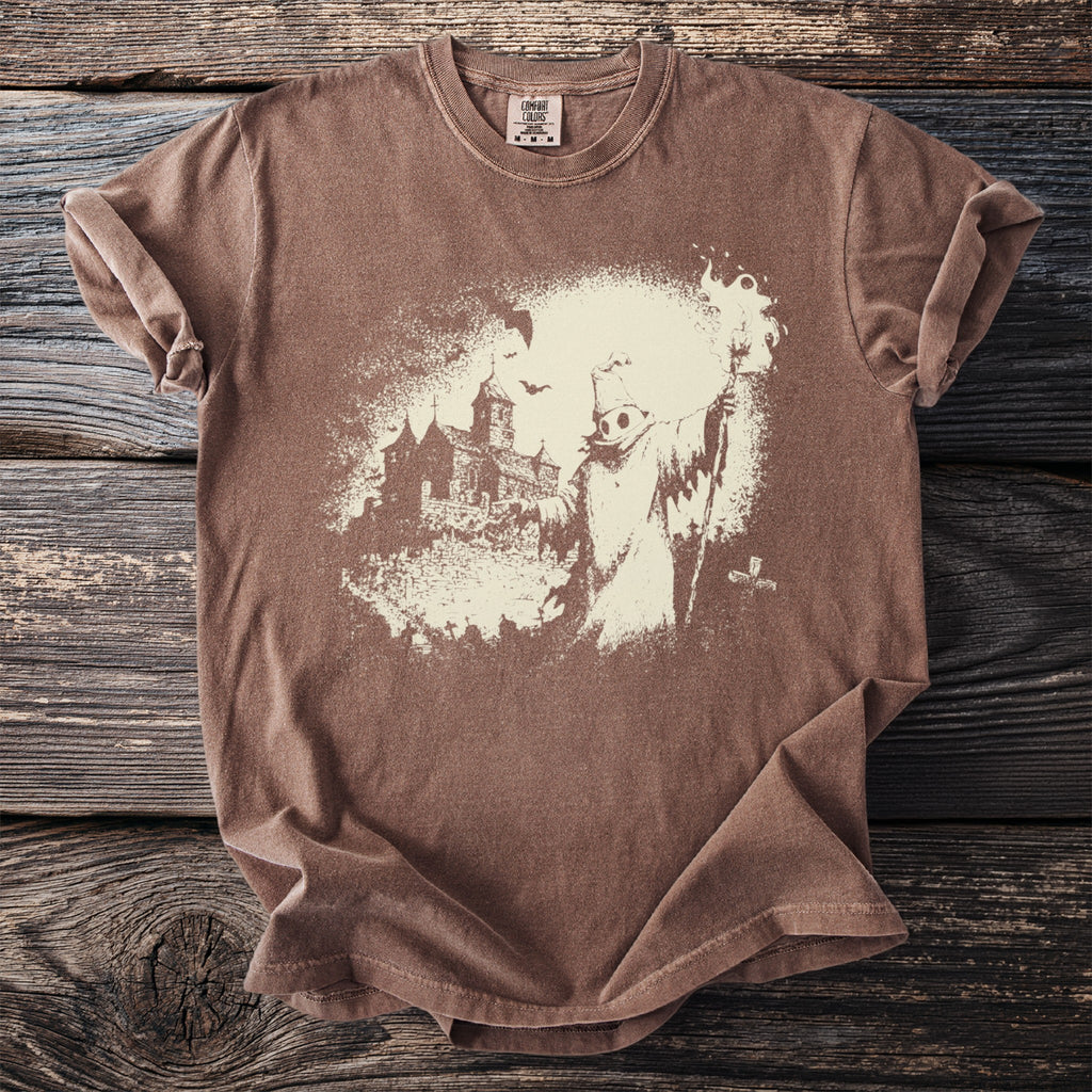 Brown Comfort Colors t-shirt with a vintage ghost and haunted castle graphic.