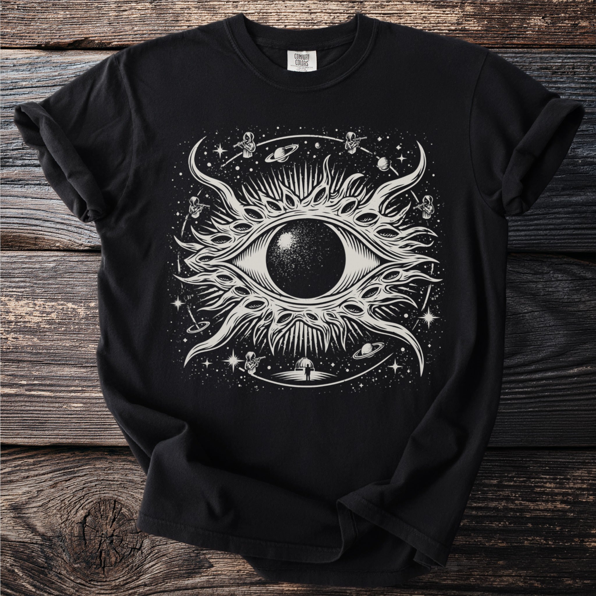 Black t-shirt with an all-seeing eye and cosmic elements including astronauts and planets.