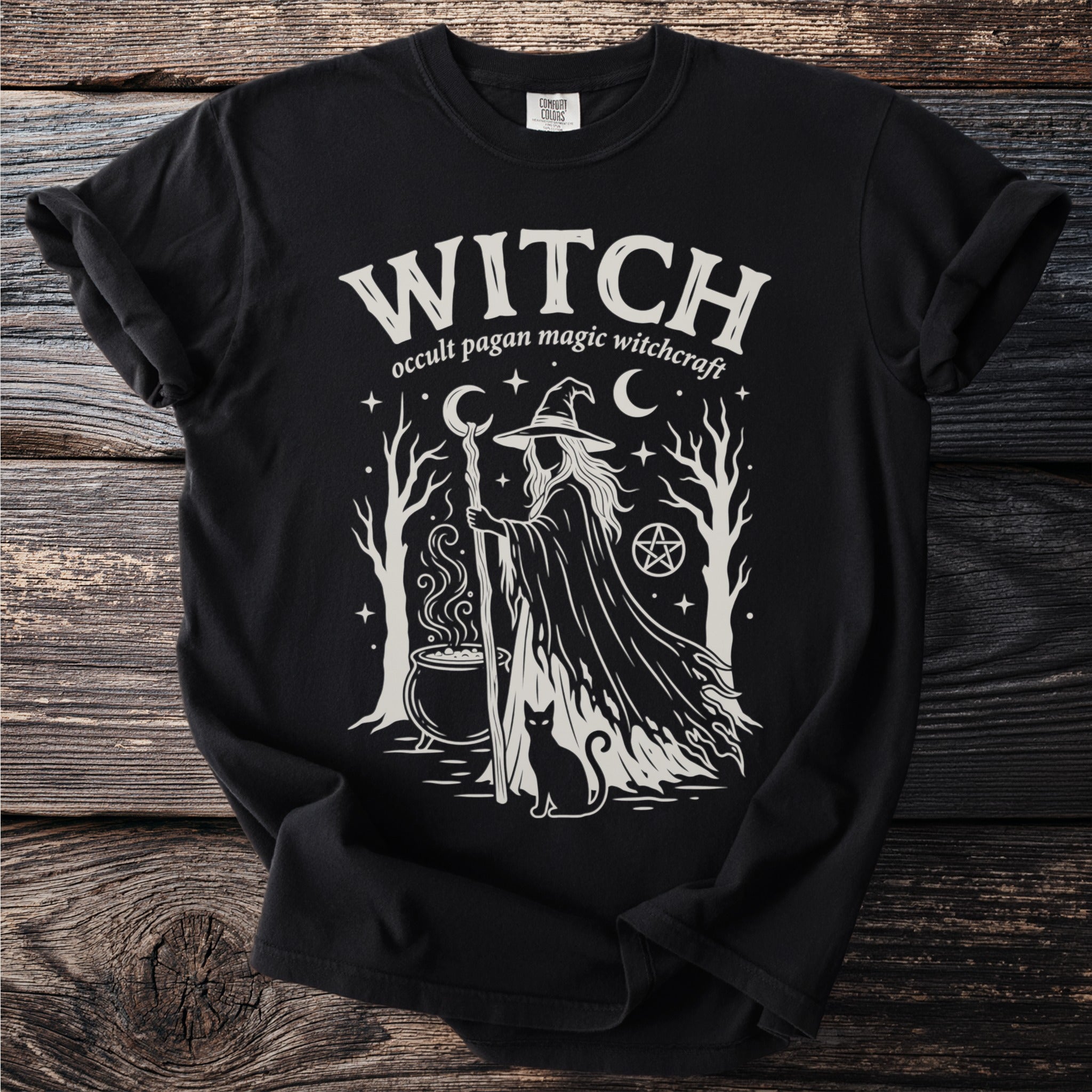 Black t-shirt with "WITCH occult pagan magic witchcraft" graphic featuring a witch and black cat.