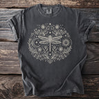 Dark grey t-shirt with a circular dragonfly, sun, moon, and floral design.