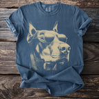 Blue t-shirt with a faded tan graphic of a doberman wearing sunglasses.