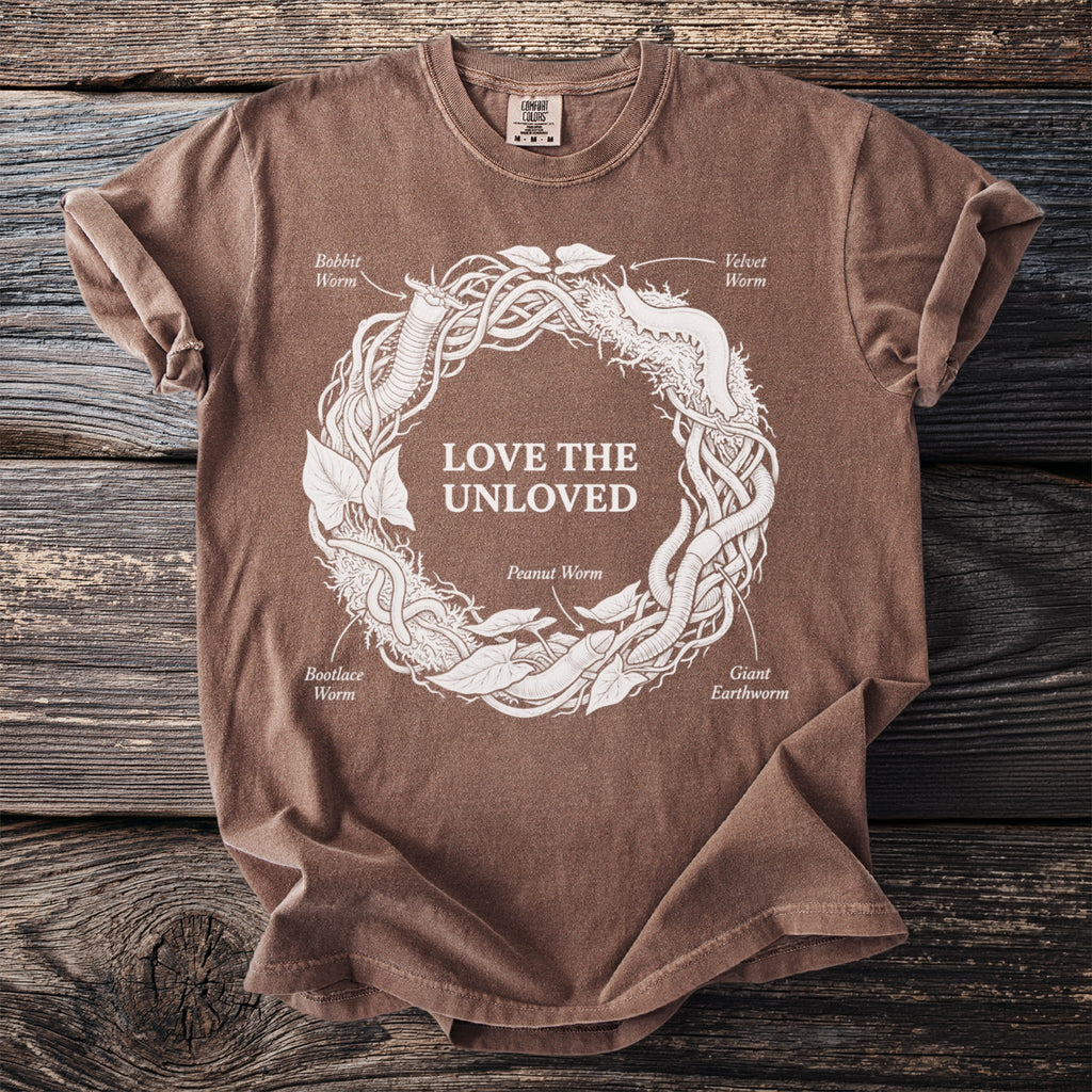 Brown t-shirt with "Love The Unloved" and illustrations of various worms.