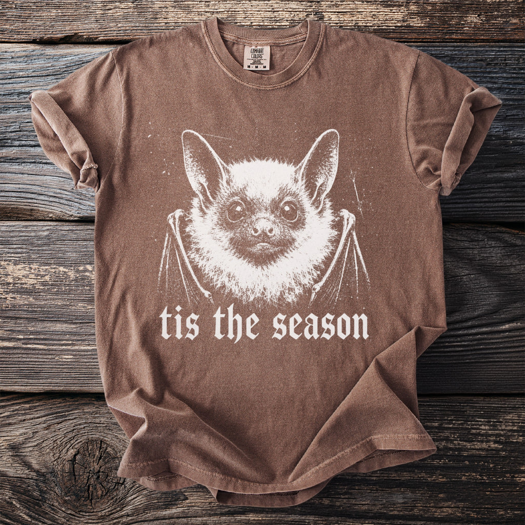Brown t-shirt with a white bat graphic and "tis the season" text.