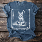 Blue t-shirt with a distressed print of a cat and text "emotionally unavailable".