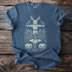 T-shirt with scarecrow, crows, pumpkins, candles, and wheat graphic.