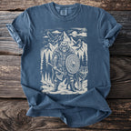 T-shirt with bear warrior, wolf, mountains, and eagles graphic.