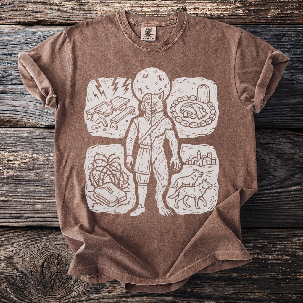 Brown t-shirt featuring a central figure split between human and werewolf, surrounded by four vignettes.