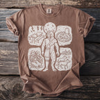 Brown t-shirt featuring a central figure split between human and werewolf, surrounded by four vignettes.