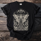 Black t-shirt with cream colored moth fairy, moon phases, and floral design.