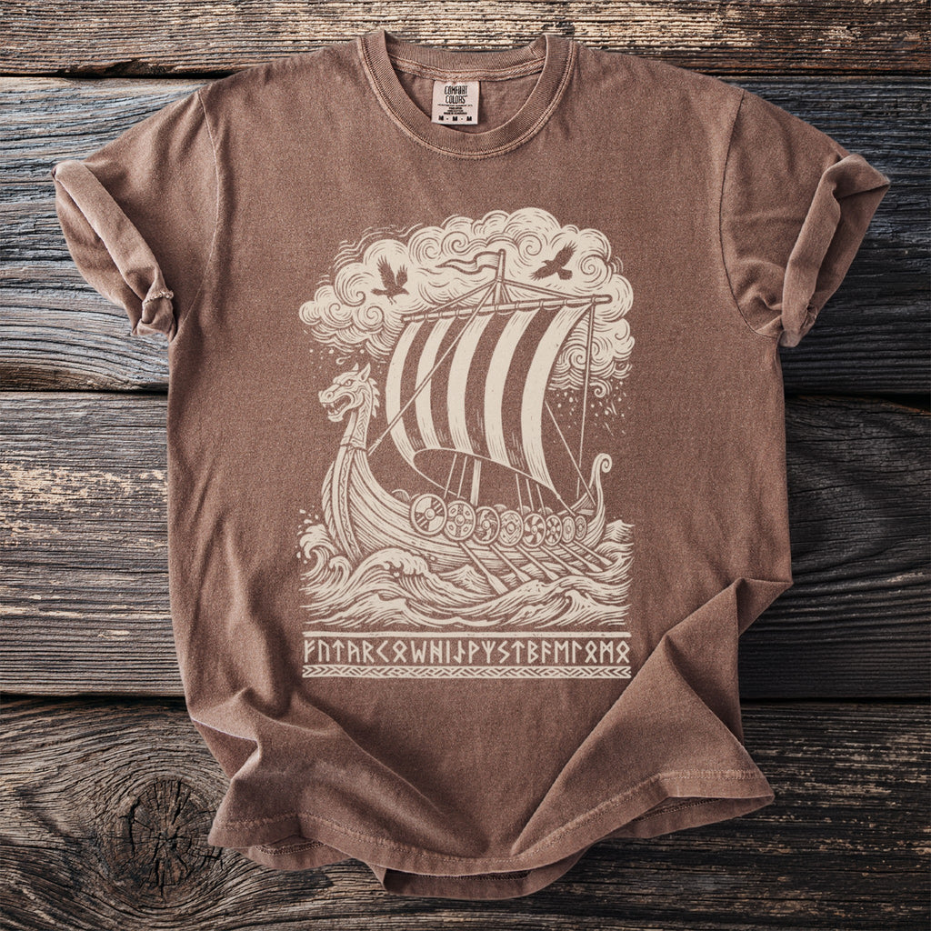 Brown t-shirt with a cream-colored viking ship illustration and runic text.