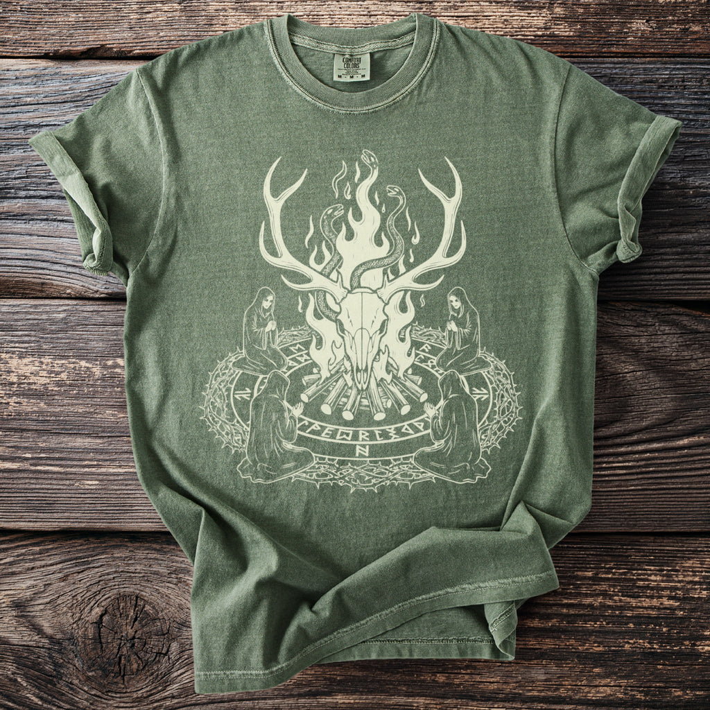 Green t-shirt with a light print of a deer skull, snakes, and robed figures around a circle.
