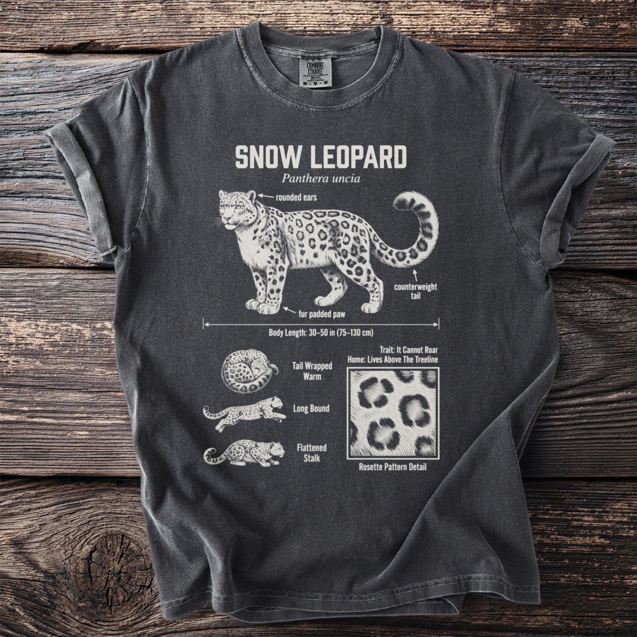 T-shirt with a detailed illustration of a snow leopard and its features.