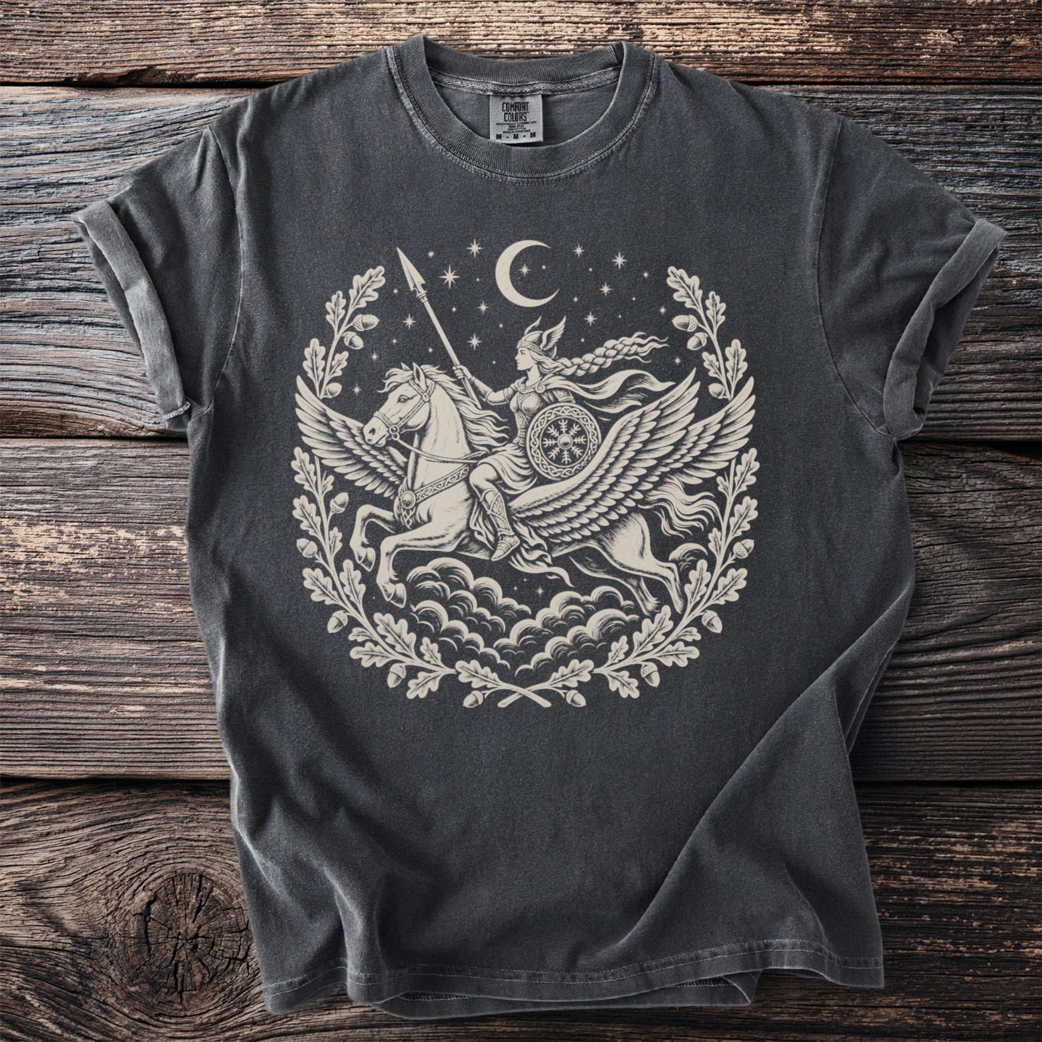 Dark gray t-shirt with Valkyrie on a winged horse, moon, and oak wreath.