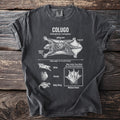 Colugo illustration with anatomical details on a dark t-shirt.