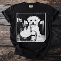 Black t-shirt with a dog looking at a beer being poured into a mug.