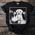 Black t-shirt with a dog looking at a beer being poured into a mug.