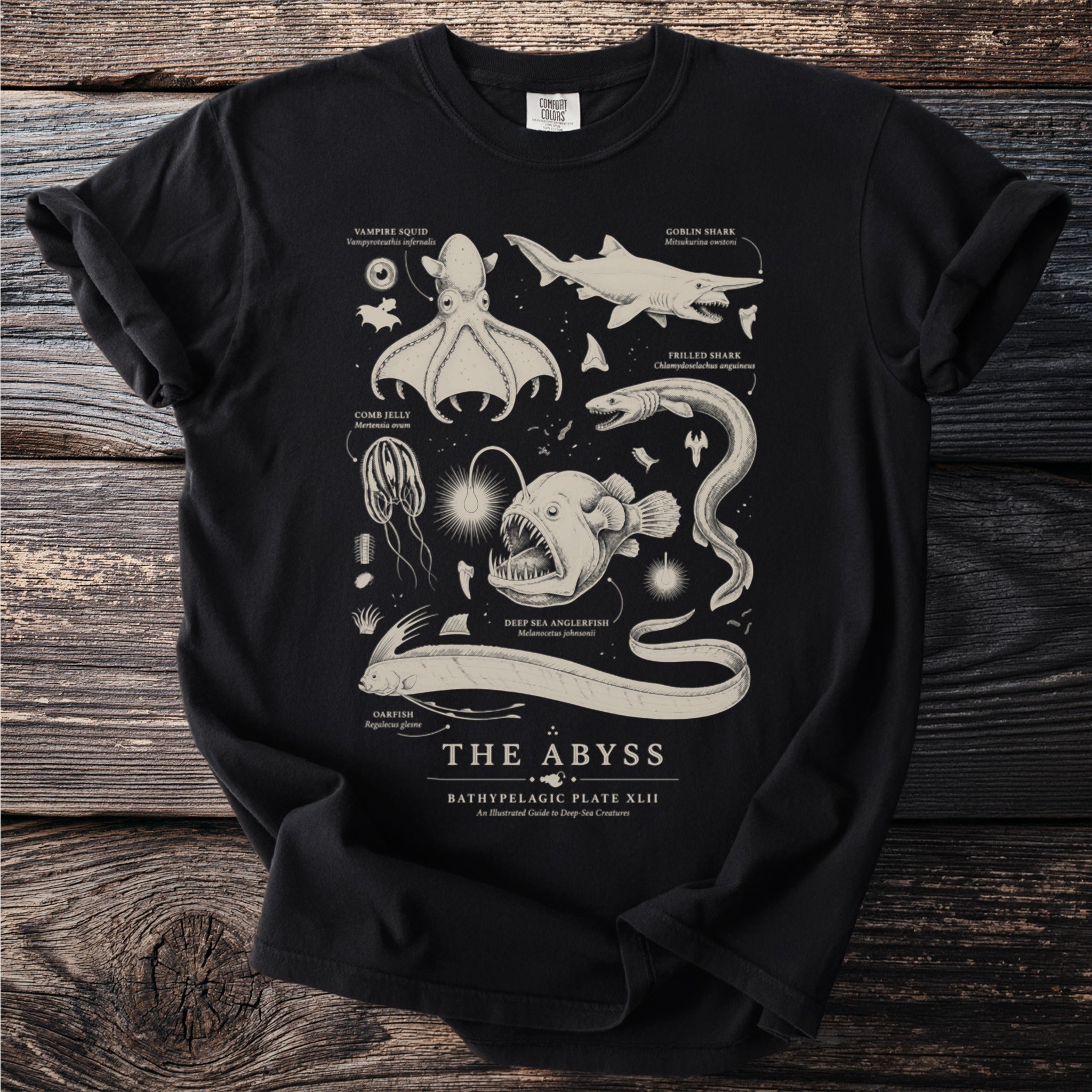 Black t-shirt with deep-sea creatures illustration and text "THE ABYSS".