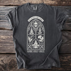 Dark t-shirt with gothic window design featuring a skull, plants, and poison.