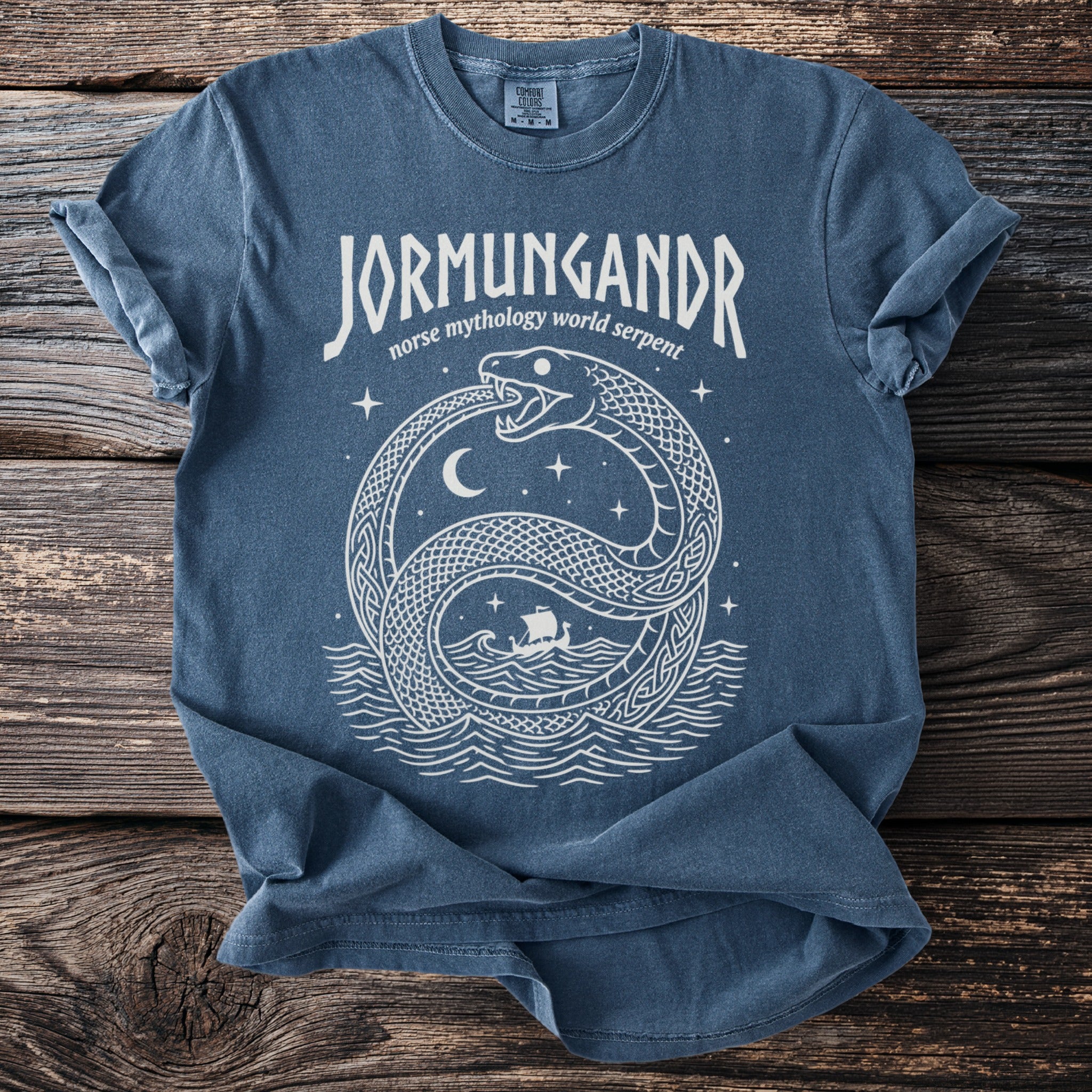 T-shirt with white "Jormungandr norse mythology world serpent" text and serpent graphic.