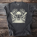 Dark gray t-shirt with moth-like creature on a bridge graphic.