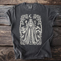 Dark grey t-shirt with a white graphic of a queen, moon, trees, birds, and a ship.