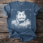 Blue t-shirt with white screen print of a hamster eating a treat.