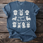 T-shirt with sketch art of various dog breeds and text "respect the locals."