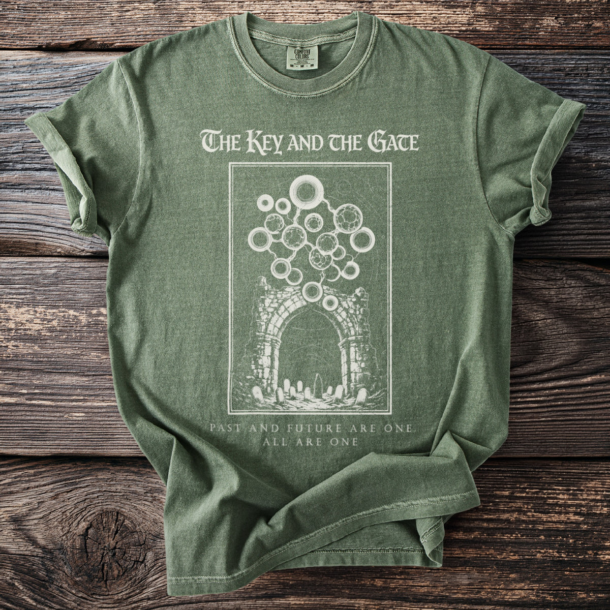 Green t-shirt with "The Key and the Gate" and "Past and Future Are One" text.