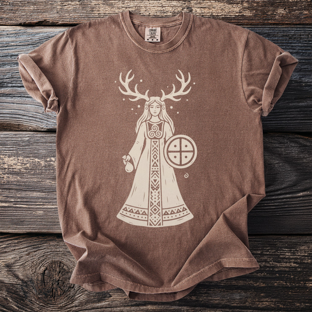 Brown t-shirt with a graphic of a woman with antlers holding a shield.