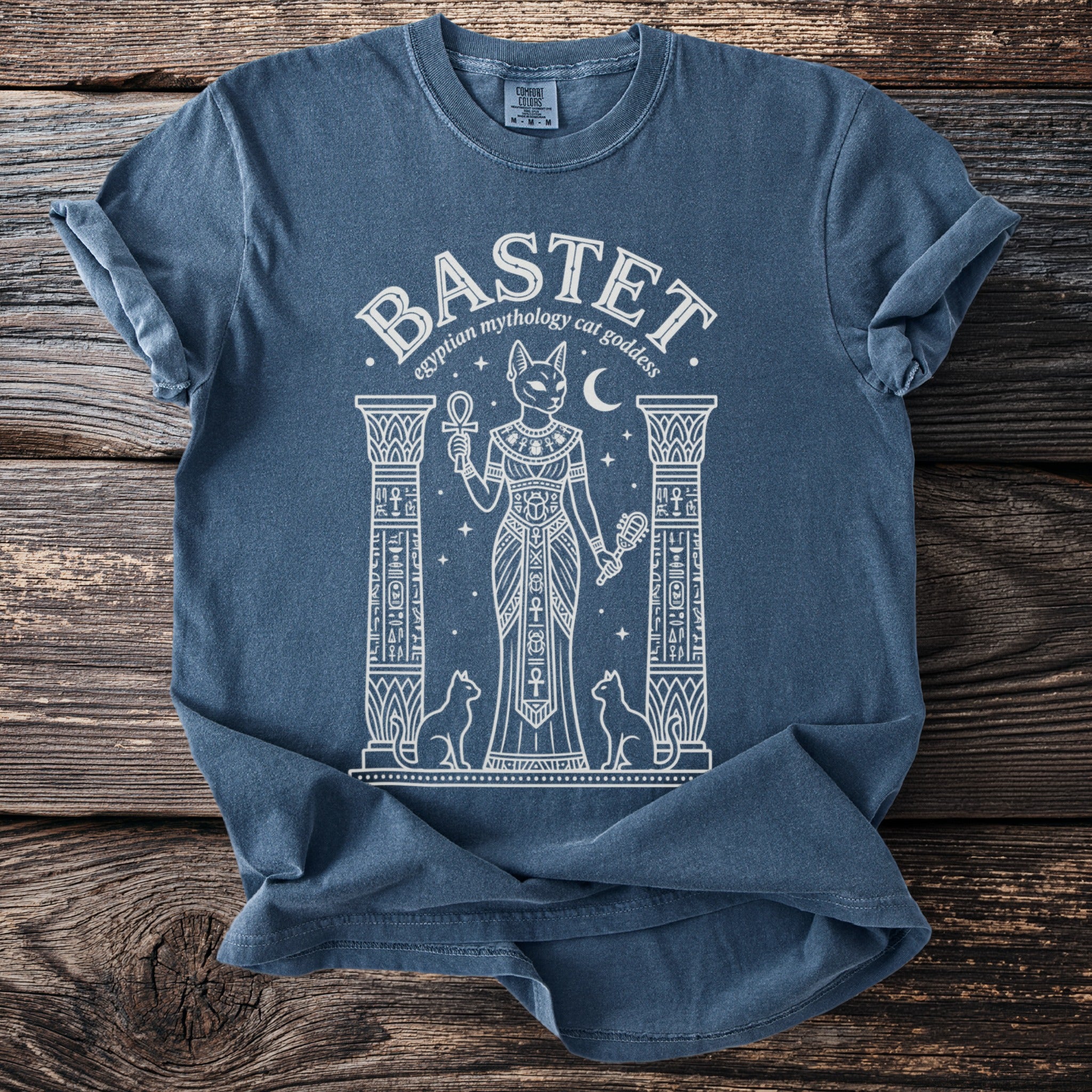 Bastet Egyptian mythology cat goddess print on blue t-shirt.