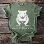 Green t-shirt with white graphic of a rat and the text "man i feel like a rat".