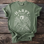 Green t-shirt with white "HARPY greek mythology winged spirit" design and a harpy illustration.